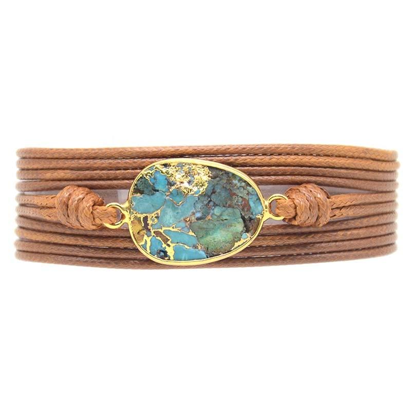 Brazalete cruzado dorado con jaspe oceánico