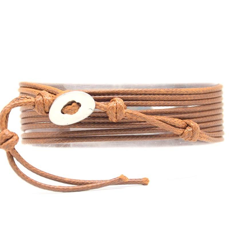 Brazalete cruzado dorado con jaspe oceánico