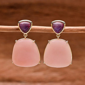 Opbeurende roze opaal keizerssteen oorbellen